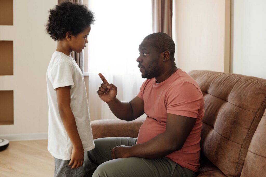 father talking to son