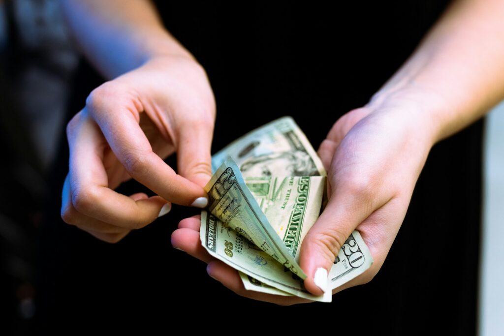 person counting cash