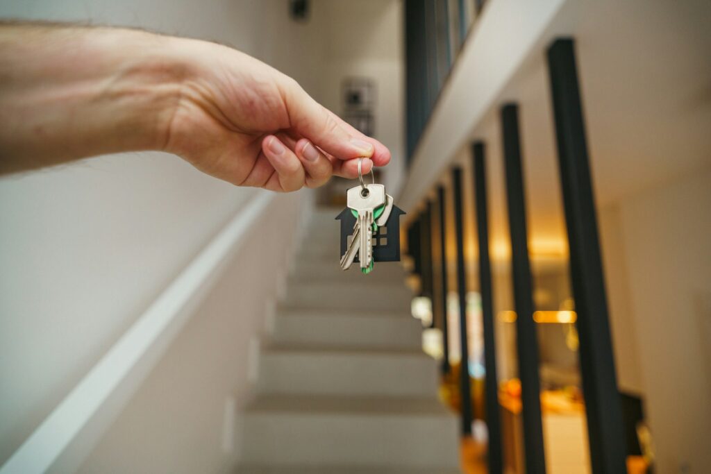 person carrying a house key