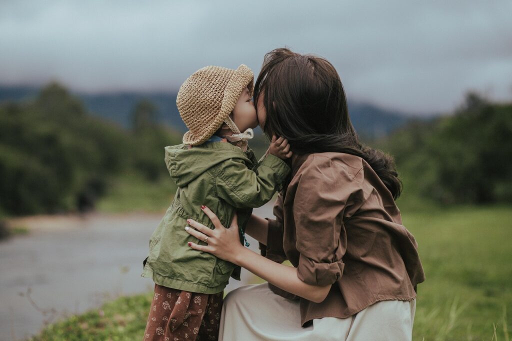mother-6935336_1280 A mother and child amid nature background