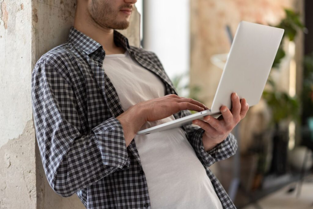 person checking on his laptop