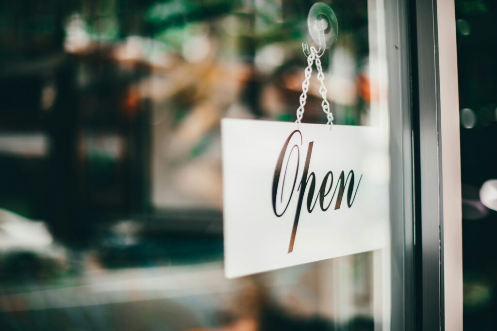 anima-visual-PS_-DwoNUJ4-unsplash An "open" sign on business establishment