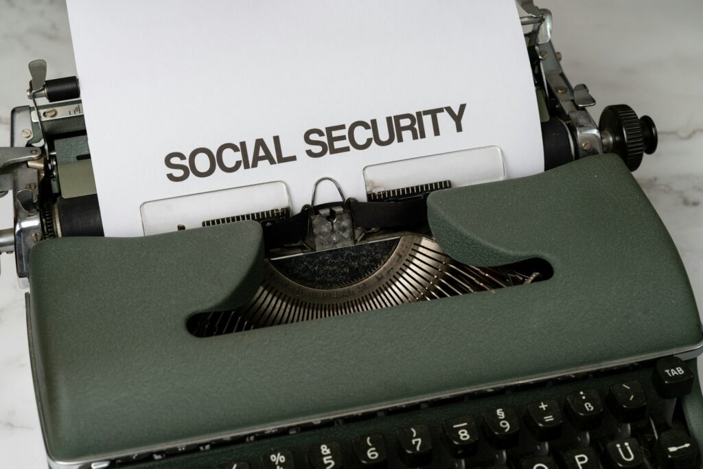 markus-winkler-HwEwAYr0d7w-unsplash Typewriter with paper wrtten "Social Security"