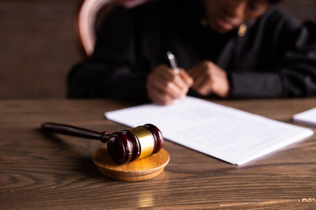 judge signing a paper