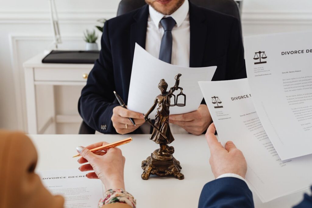 couple at a law office looking at divorce decree documents
