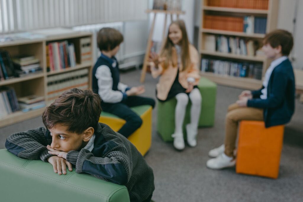 A child feeling isolated in a group