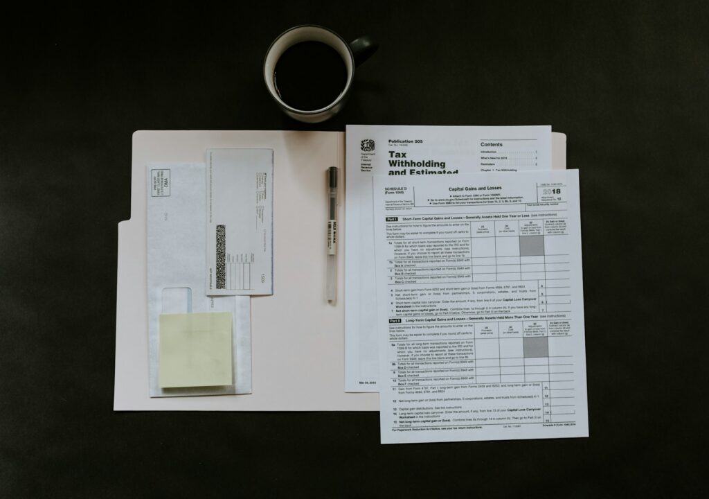 kelly-sikkema-8DEDp6S93Po-unsplash financial documents