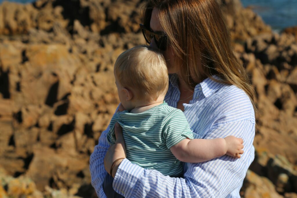 a mother holding a child