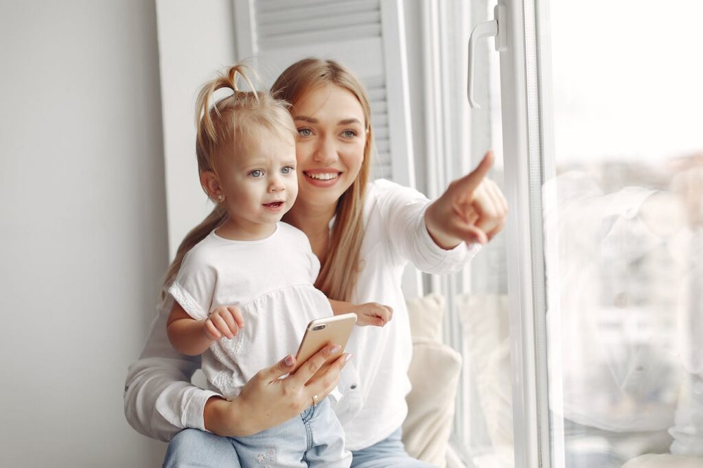 mother and daughter wearing white tops