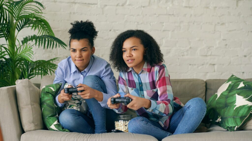 two women playing video games