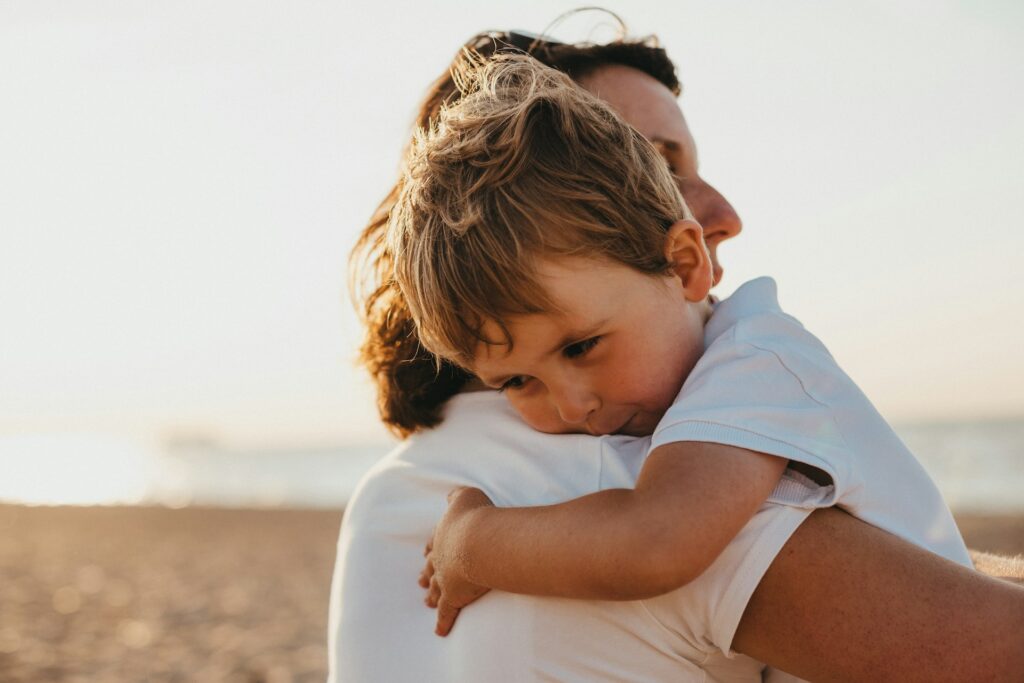 woman carrying a child