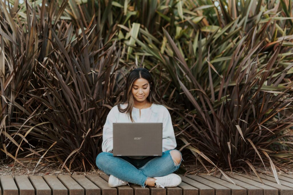 young woman using laptop