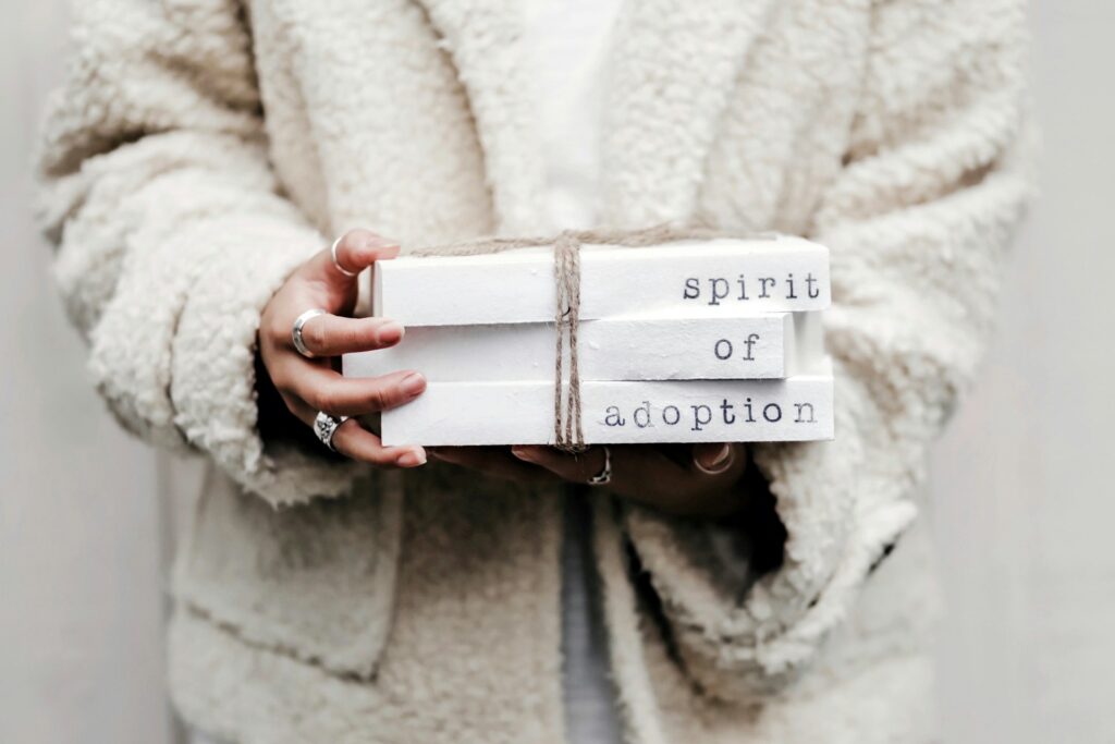woman holding spirit of adoption blocks