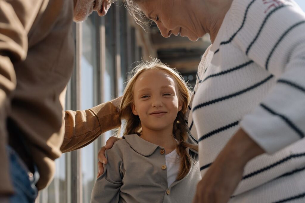 elderly couple with grandchild