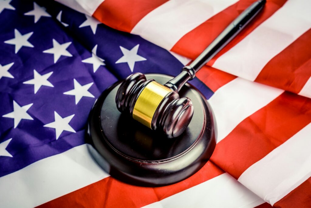 judge's gavel on US flag