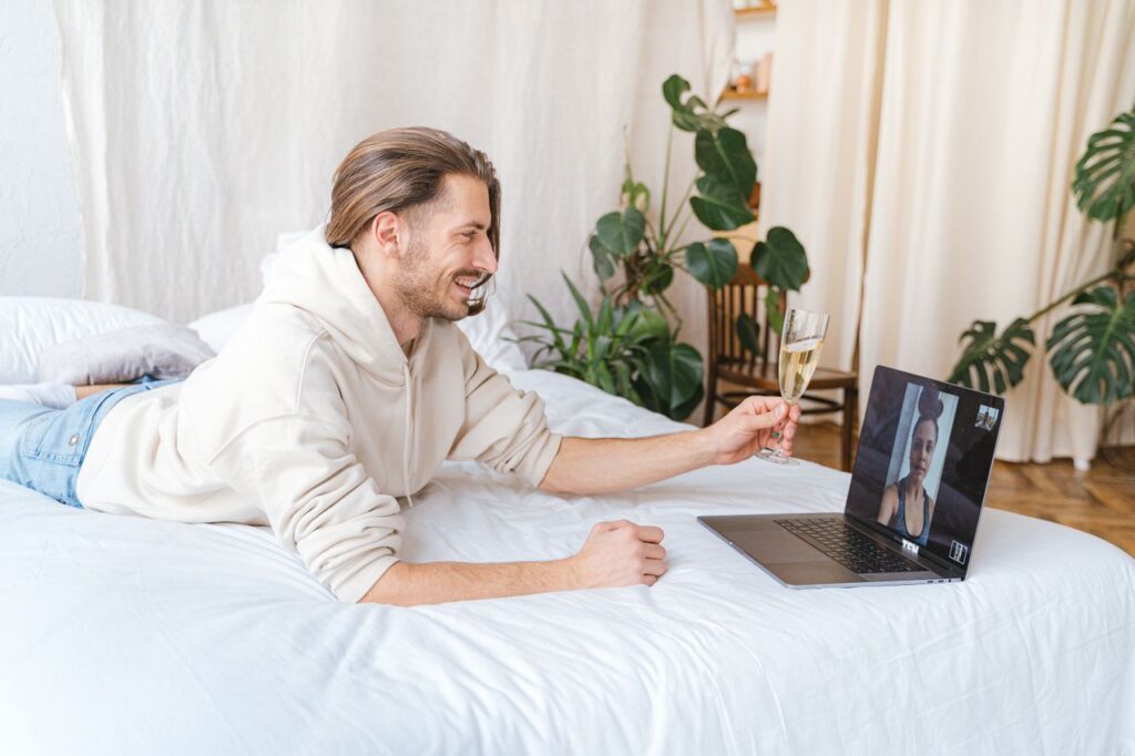 man on a videocall with a woman