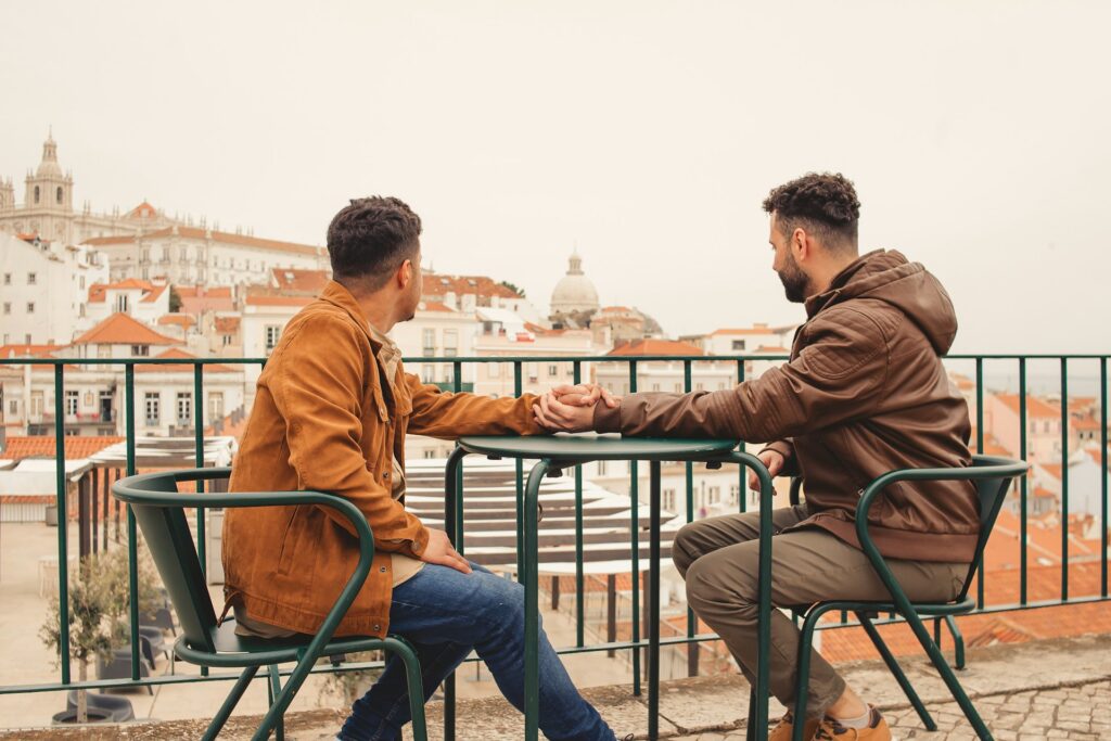LGBT couple holding hands