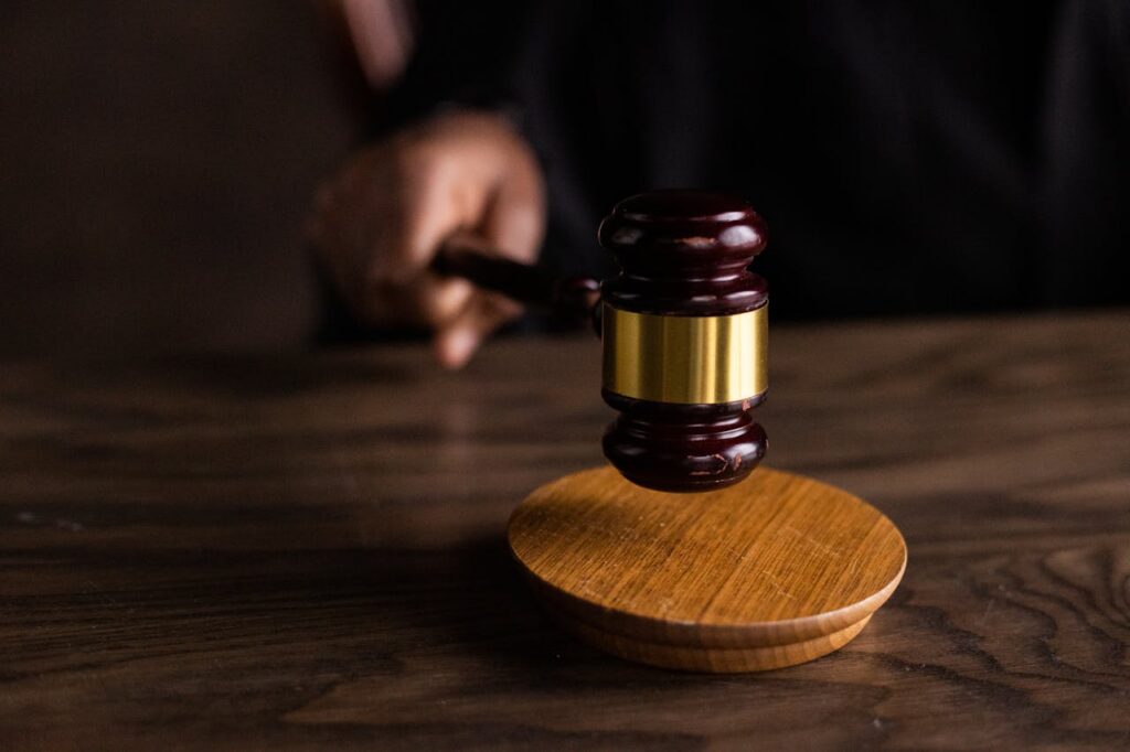 pexels-ekaterina-bolovtsova-6077326 brown wooden gavel on brown wooden table