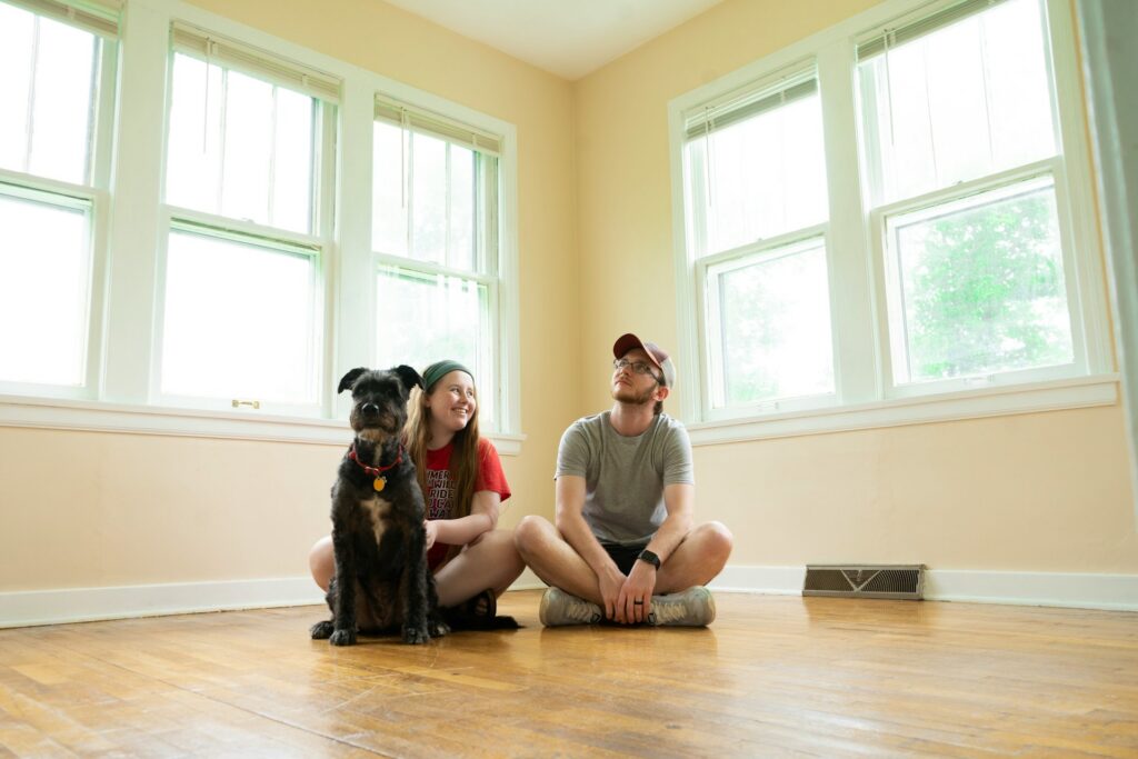 couple at home with dog