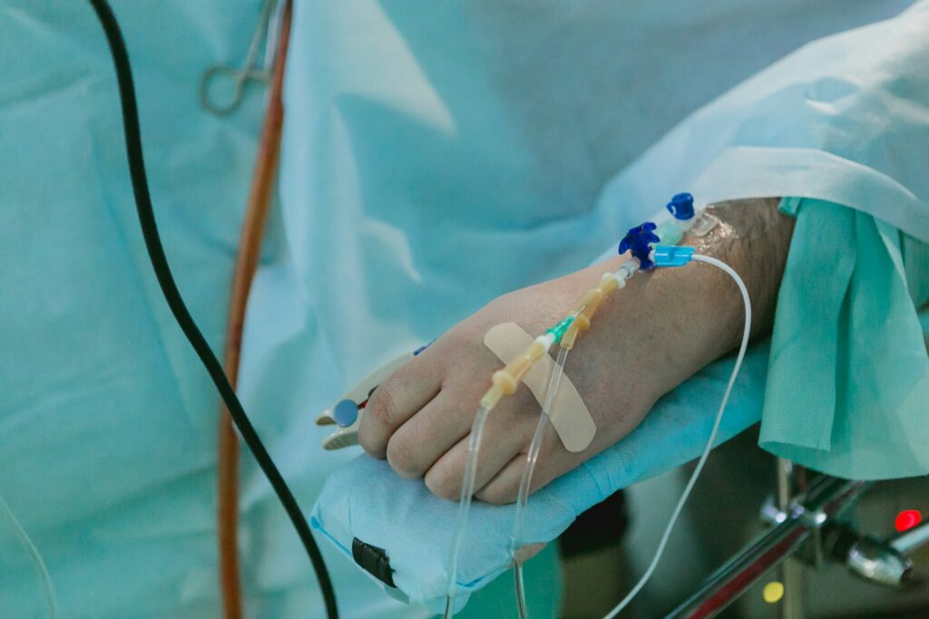 person in a hospital with IV