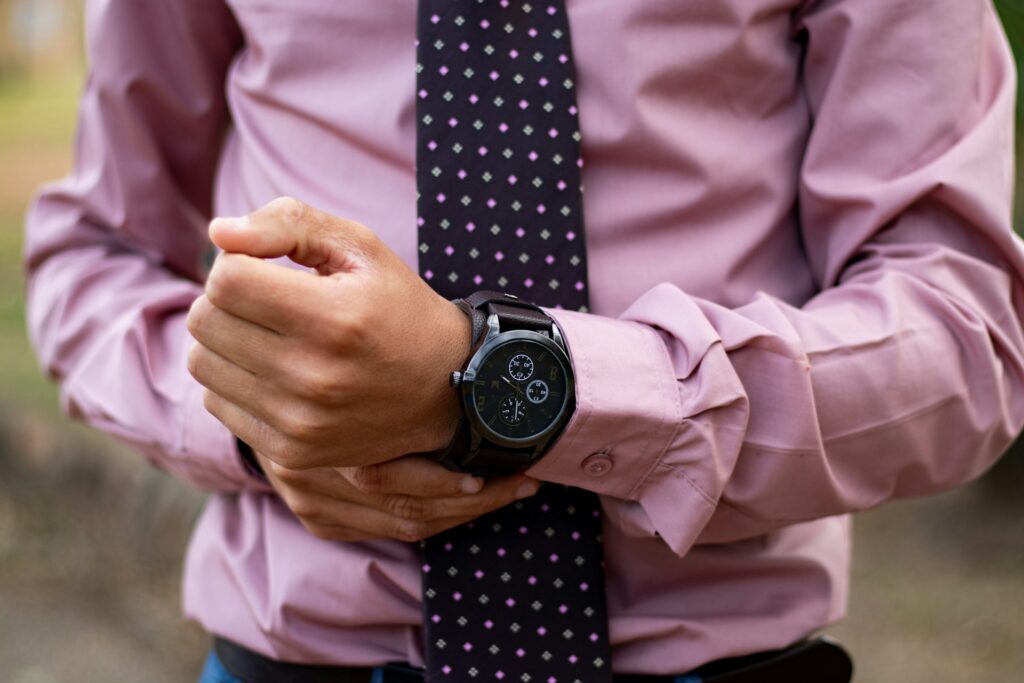 man in suit wearing watch