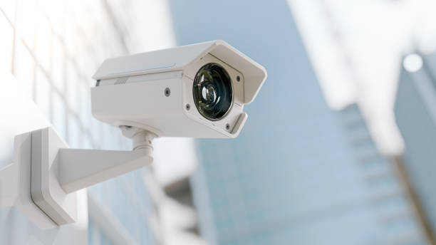 Surveillance camera mounted on a wall, emphasizing the role of video evidence in family and criminal law contexts.