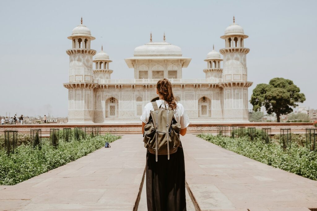 ibrahim-rifath-Y6tBl0pTe-g-unsplash a woman visiting a travel destination