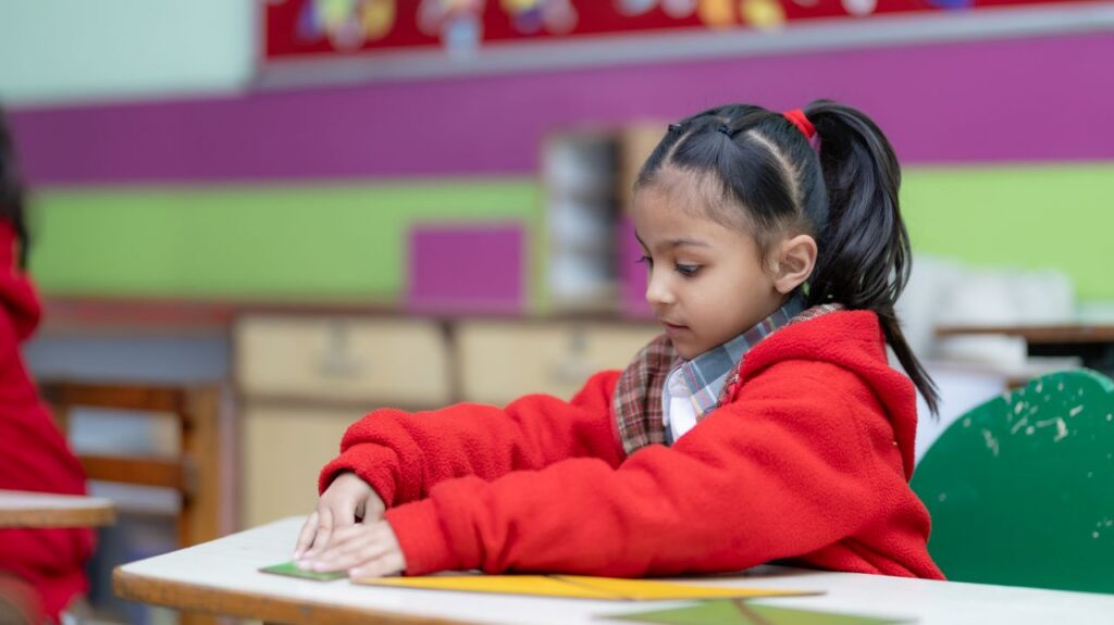 young girl in a classroom