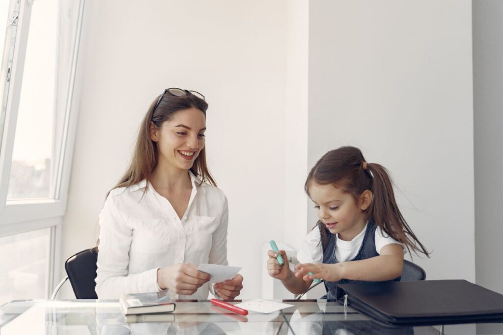 woman and child in an office