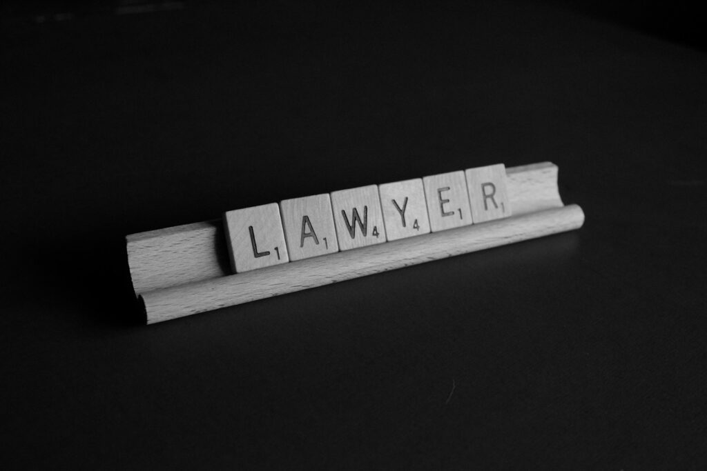 scrabble chipds with the word "lawyer"