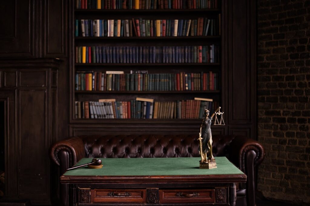 lawyer's office with justice figure on desk