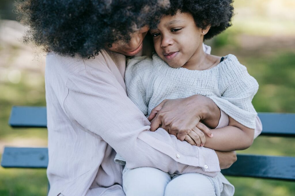 mother hugging her child