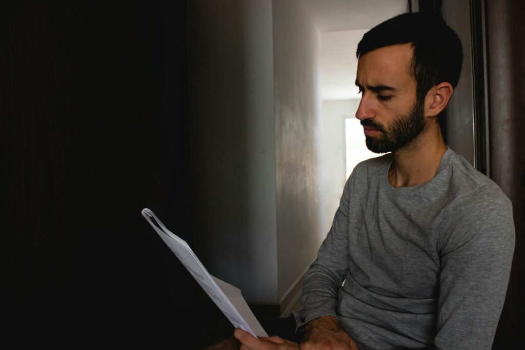 a man reading a document