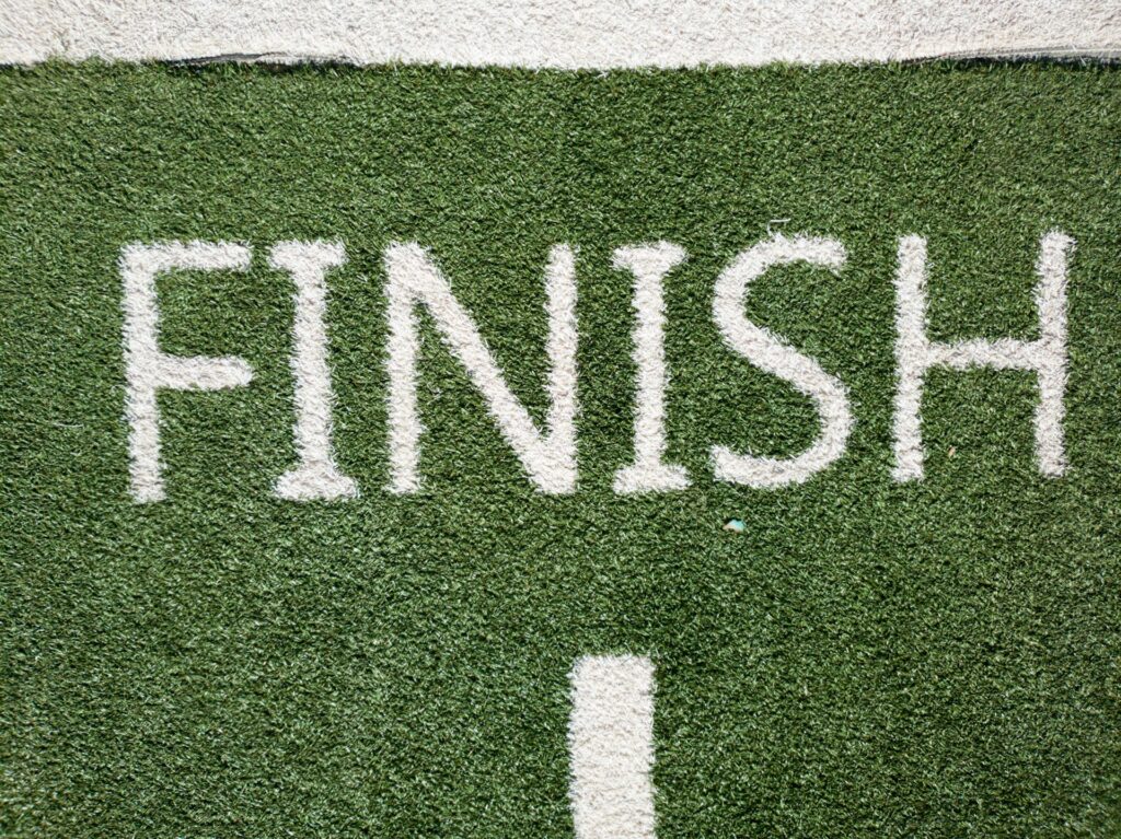 the word "finish" on the grass