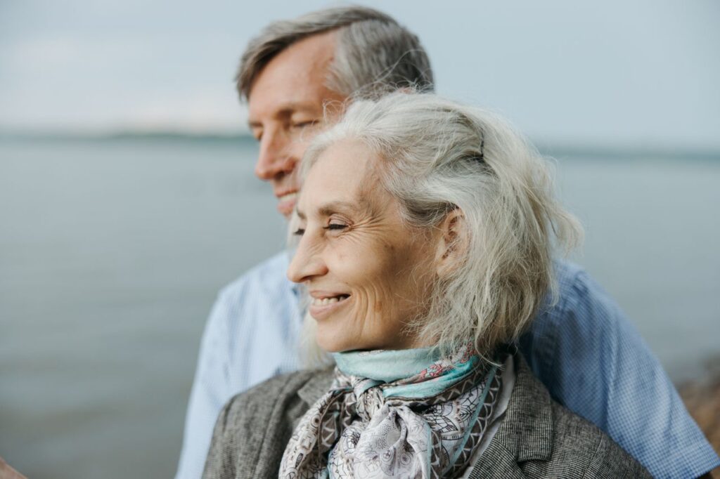 elderly couple at a beach
