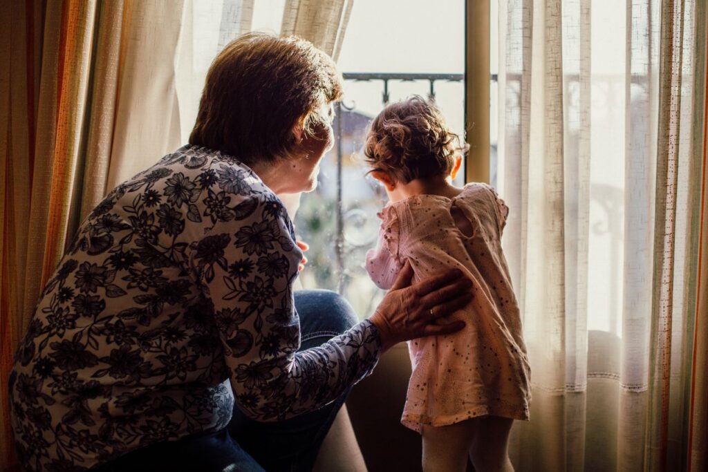 woman holding a child
