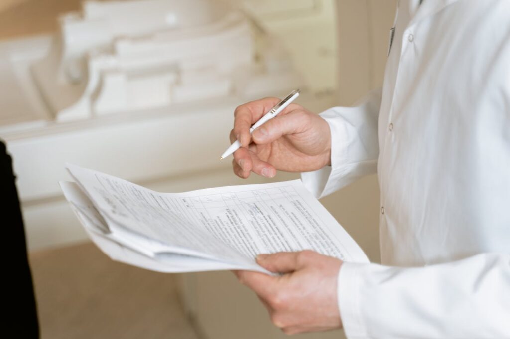 doctor filling out a form