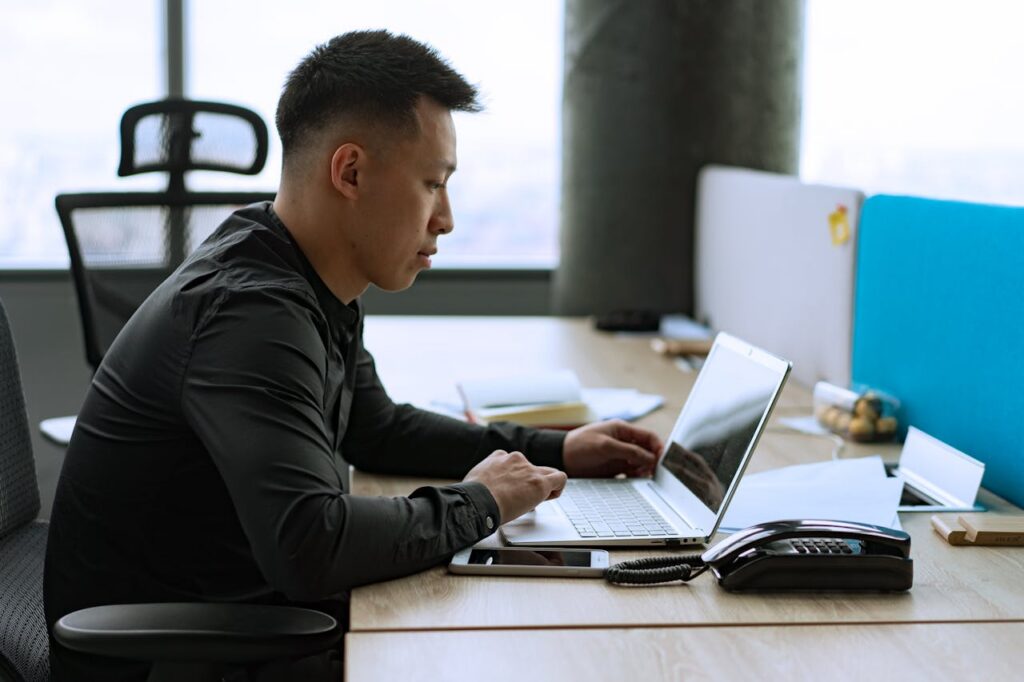 man using a laptop