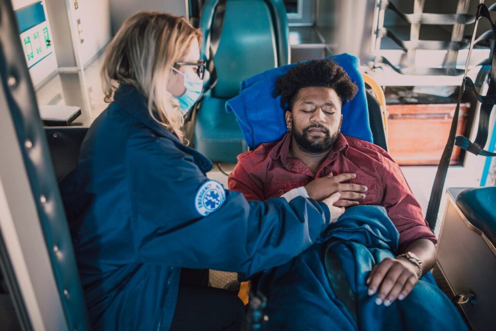 man lying on a stretcher