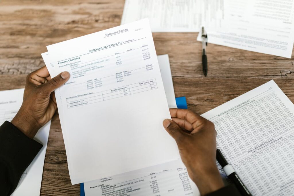 person reading financial document