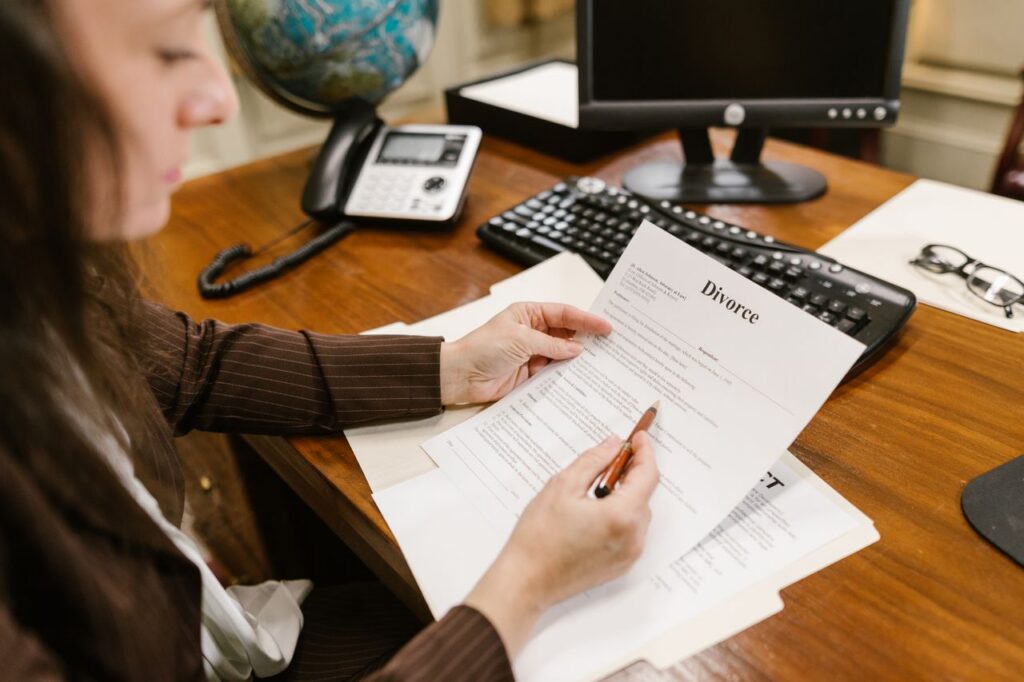 woman reading a divorce form
