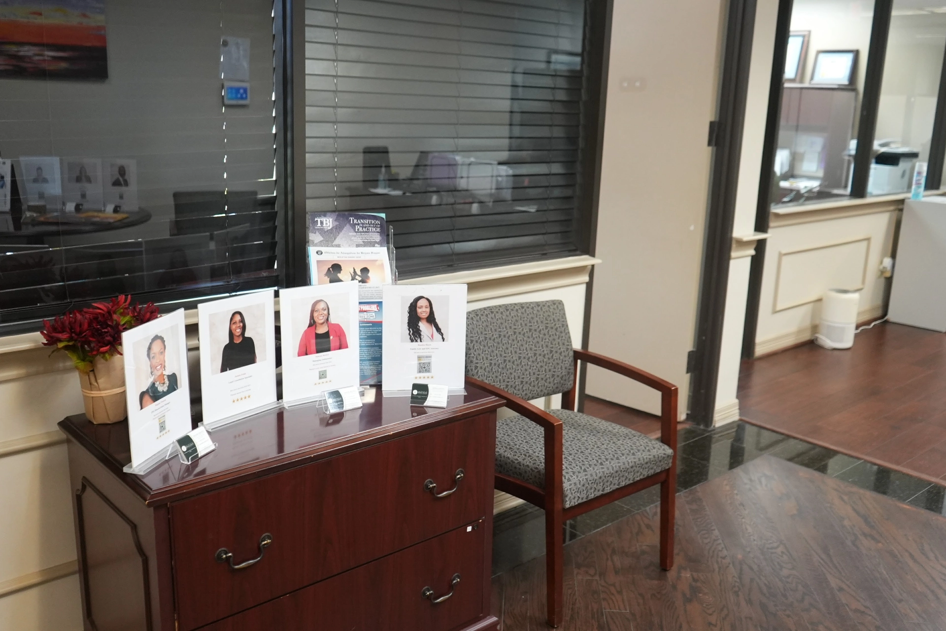 Reception area at River Oaks office with staff displays and seating