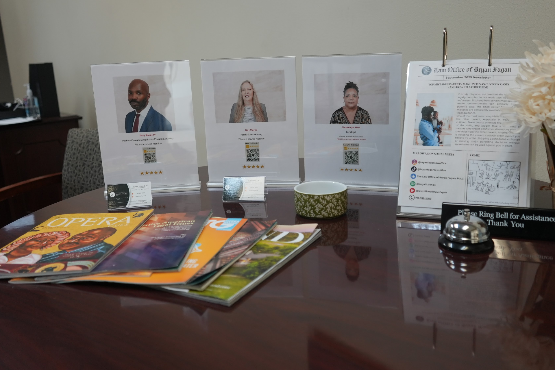 Office display with team profiles and informational materials