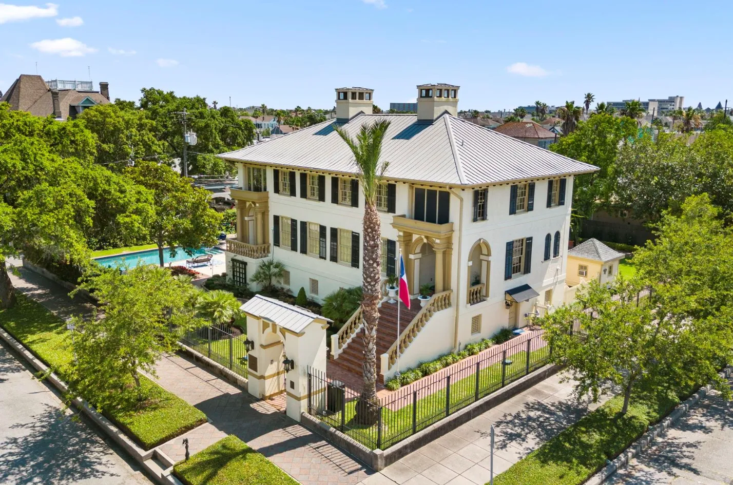 Aerial exterior view of the Galveston Office on Market Street, surrounded by trees in Galveston, Texas.
